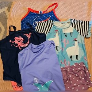 Lots of girls bathing suits size Large